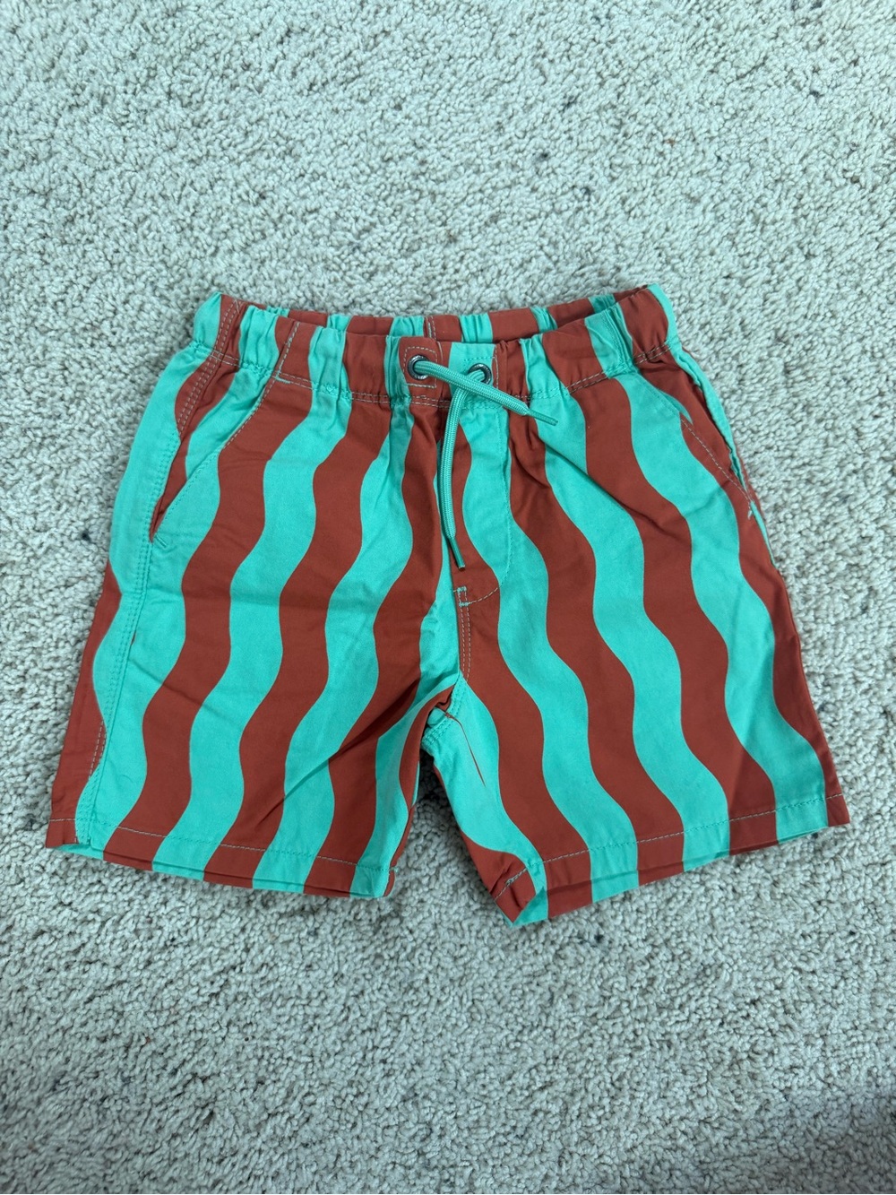Next Direct Kids Wave-Stripe Swim Shorts in Teal and Rust